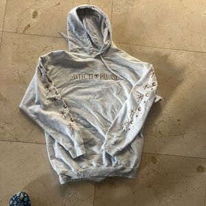 Kat Graham Hoodie with Gold Star and Moon Design